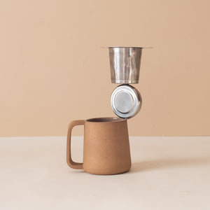 ceramic mug and tea infuser