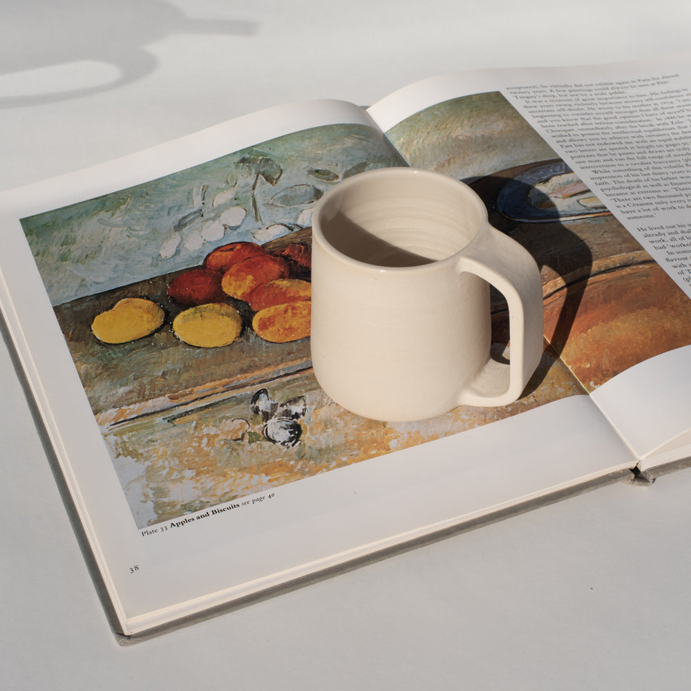 White ceramic tea mug