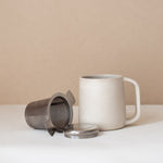 stainless steel tea infuser and ceramic mug